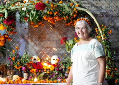 An older woman posing in an altar