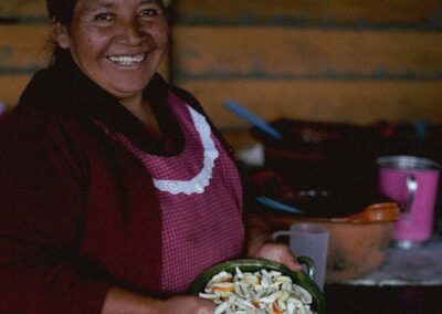 A woman with a bowl of food