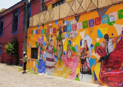 a mural of women in dresses