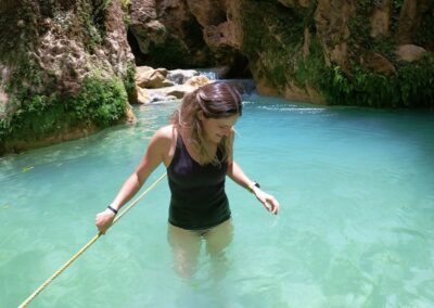 Hike & Swim @ Iconic Apoala Waterfalls 14 A person in the lagoon with blue water