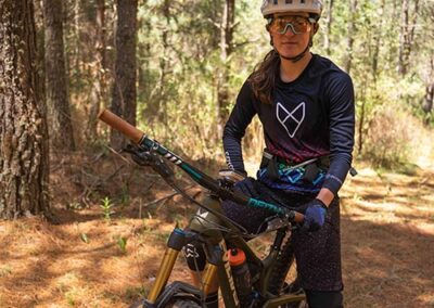A person sitting on top of mountain bike