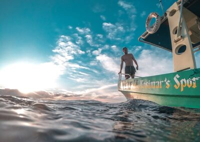 A person standing on a ship in the sea