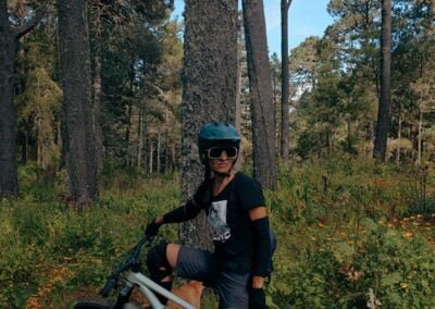 A person sitting on top of mountain bike