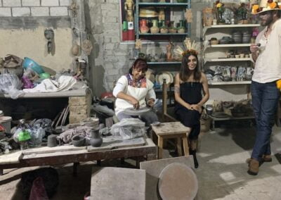 A woman preparing herself to be face painted