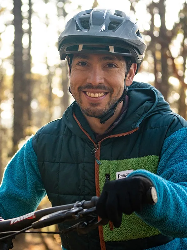 Dylan leaning on a pole